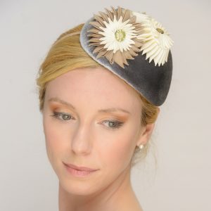 Velvet headpiece with cockades side view