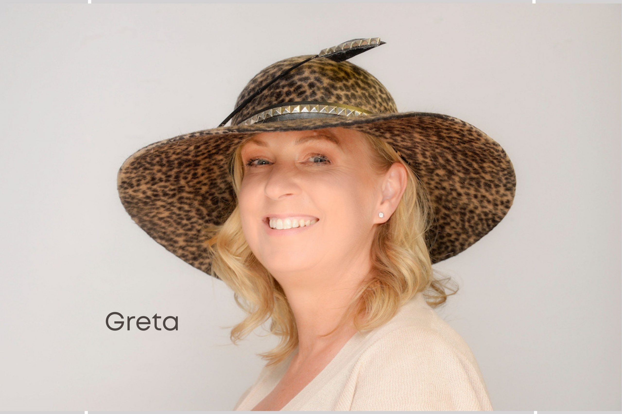 Greta – is an animal print melusine felt brimmed hat with a studded leather hatband